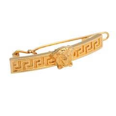 versace hair clip fake|versace brooch.